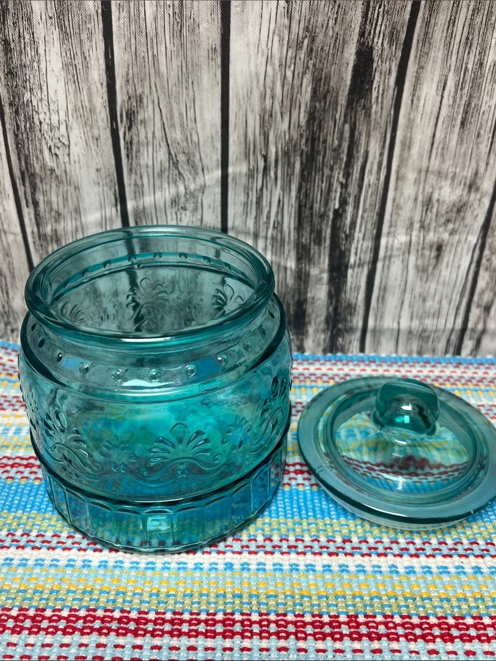 The Pioneer Woman “Cassie” glass embossed canister-small 33oz- 5”x5.75”- Teal